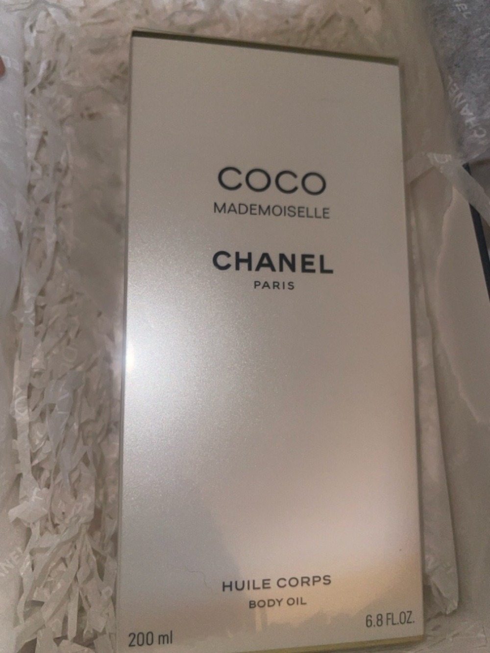 CHANEL Silky Moisturizing Oil Packaging in White and Gold